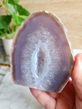 Load image into Gallery viewer, Embrace Agates soothing presence during meditation, allowing its gentle vibrations to cleanse the mind and spirit, guiding you towards inner peace and enlightenment
