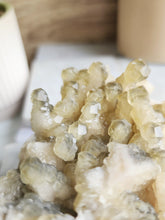 Load image into Gallery viewer, The vibrant energy of Yellow Calcite fosters joy and optimism, while Black Calcite provides stability and protection. Together, they encourage transformation and balance
