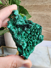 Load image into Gallery viewer, Malachite, a stunning green copper mineral, is known for its beauty and spiritual benefits. It helps with personal transformation, clears negative energy, boosts intuition, and supports emotional healing, making it perfect for life changes
