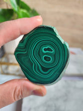 Load image into Gallery viewer, Tap into Malachite’s protective and empowering energy. Known for its vibrant green layers, Malachite not only absorbs negative energy but also enhances your spiritual journey. Perfect for manifesting with intention and clarity
