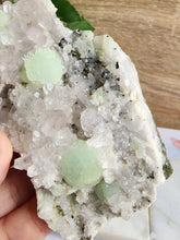 Load image into Gallery viewer, This crystal cluster blends prehnite’s calming intuition with clear quartz’s amplifying clarity. Together, they offer enhanced spiritual growth, self-healing, and deeper meditation.
