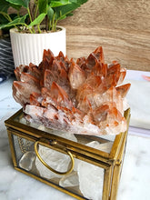 Load image into Gallery viewer, Red calcite, a dynamic carbonate mineral, is celebrated for its energizing and stabilizing qualities. It enhances motivation and emotional healing, making it a valued stone for boosting personal empowerment and vitality
