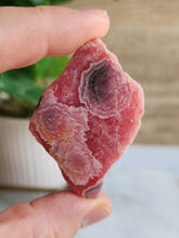 Load image into Gallery viewer, Embrace Rhodochrosite’s soothing energy to inspire compassion, harmony, and a deeper connection with your higher self
