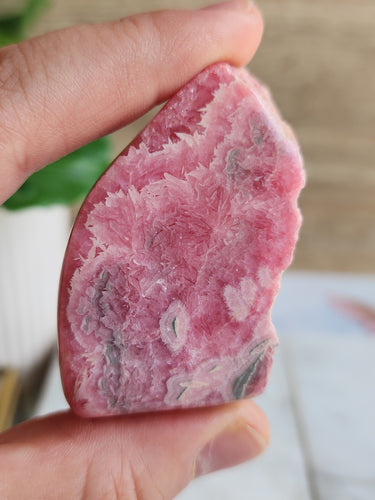 Unlock inner peace and self-acceptance with Rhodochrosite, the crystal of love and spiritual transformation