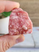 Load image into Gallery viewer, Embrace Rhodochrosite’s soothing energy to inspire compassion, harmony, and a deeper connection with your higher self
