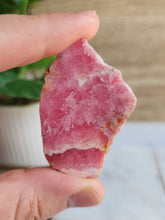 Load image into Gallery viewer, Rhodochrosite nurtures self-love, emotional healing, and spiritual growth, making it perfect for meditation and daily balance
