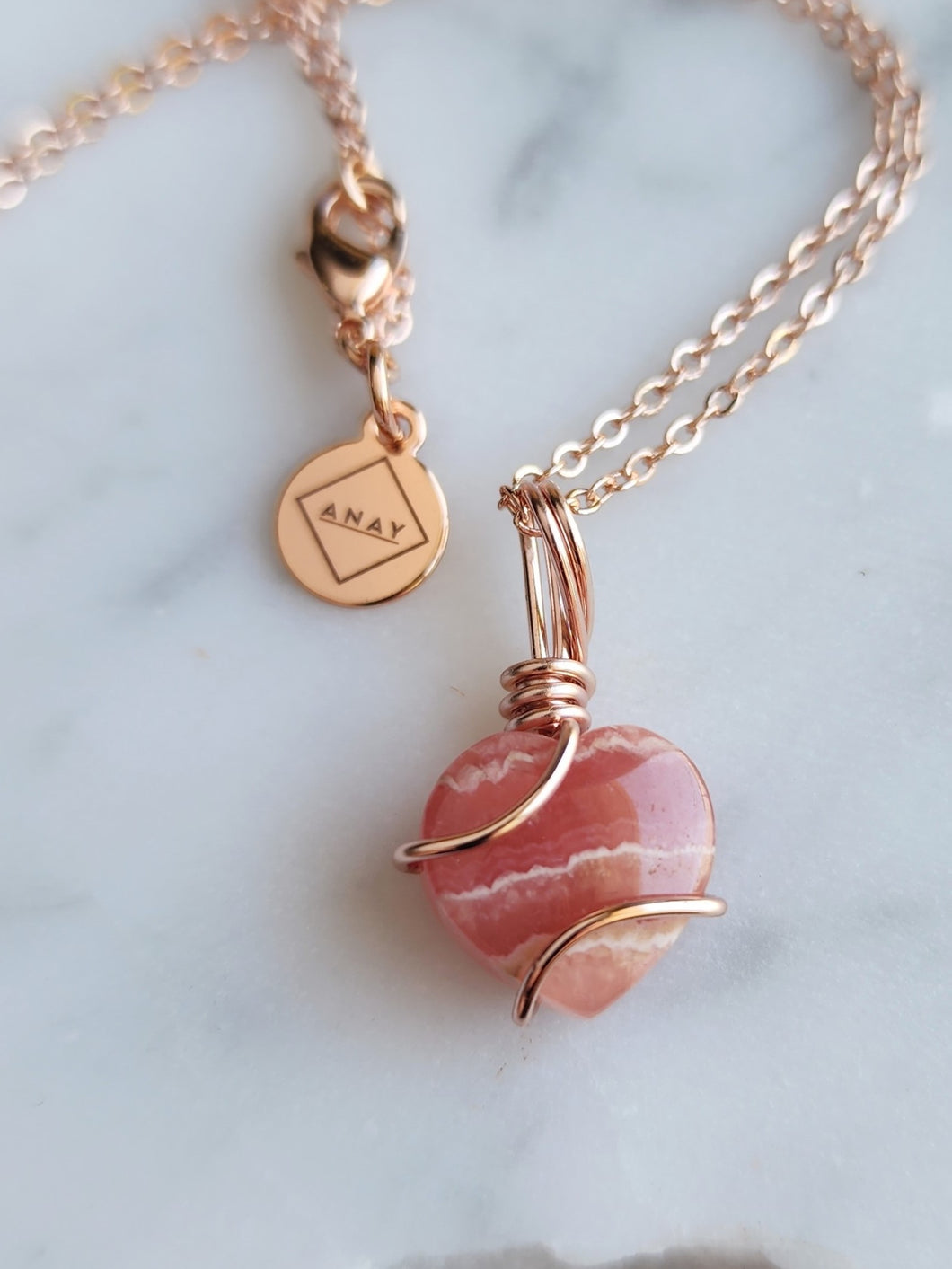 Rhodochrosite amplifies your spiritual growth and self-discovery, helping you unlock inner wisdom and connect with your higher self. Embrace its soothing energy to invite compassion, balance, and harmony into your life, making it a cherished ally on your spiritual journey