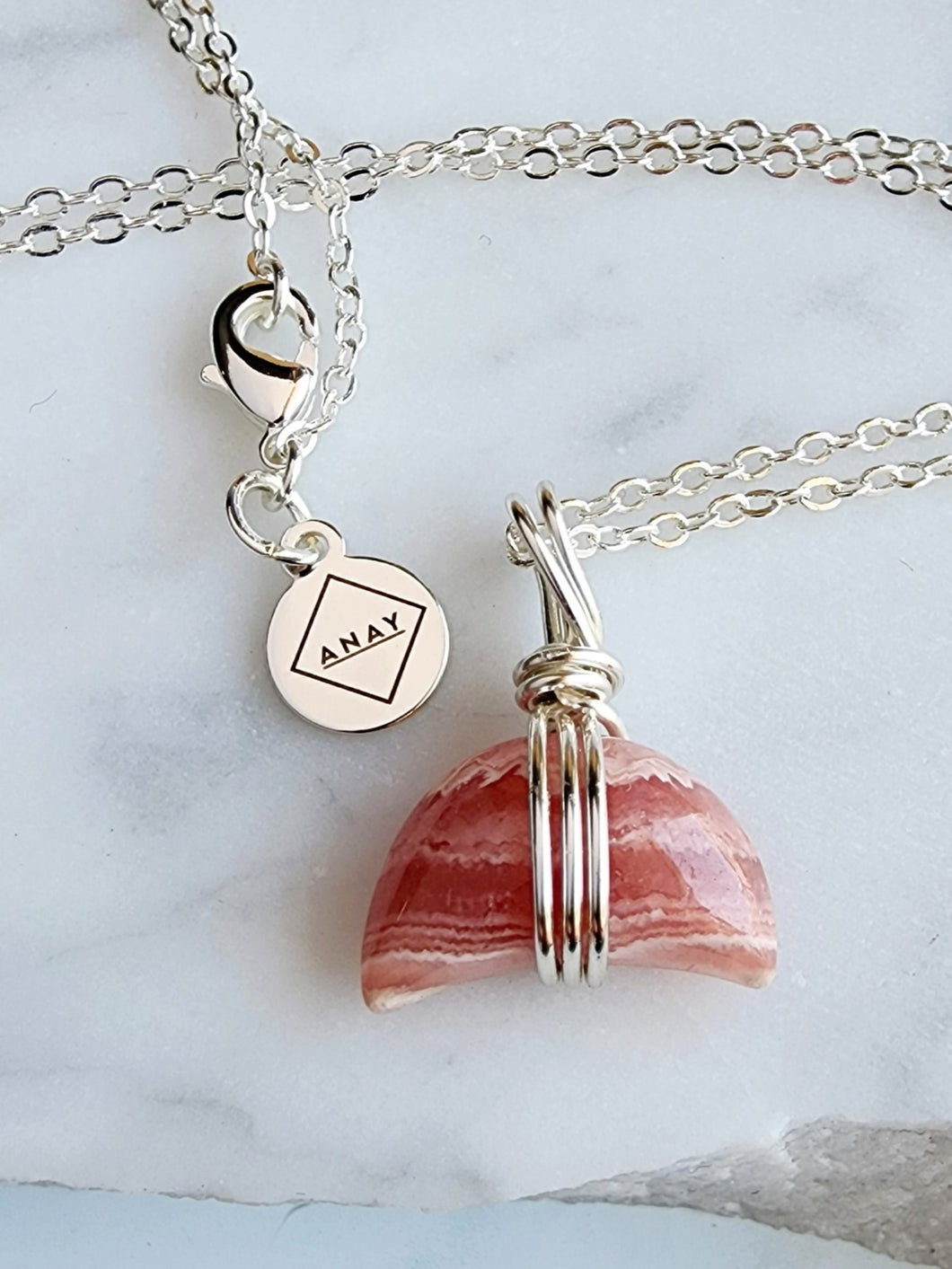 Rhodochrosite amplifies your spiritual growth and self-discovery, helping you unlock inner wisdom and connect with your higher self. Embrace its soothing energy to invite compassion, balance, and harmony into your life, making it a cherished ally on your spiritual journey