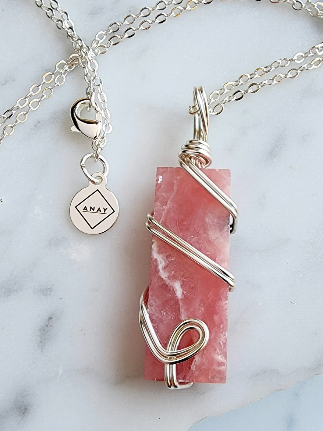 Rhodochrosite amplifies your spiritual growth and self-discovery, helping you unlock inner wisdom and connect with your higher self. Embrace its soothing energy to invite compassion, balance, and harmony into your life, making it a cherished ally on your spiritual journey