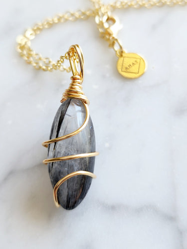 Shield yourself from negativity with Black Tourmaline in Quartz—a powerful duo that keeps you grounded and protected. Black Tourmaline absorbs unwanted energy, while Clear Quartz amplifies its strength, surrounding you with clarity and positivity